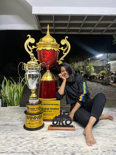 Aparna poses with her awards from off-roading competitions